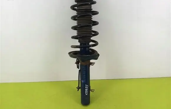 Volkswagen Golf IV Front shock absorber with coil spring