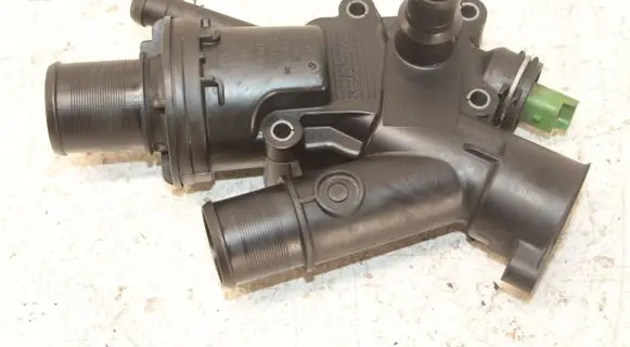 Thermostat/thermostat housing