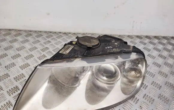 Volkswagen Touareg I Headlight/headlamp 7L6941015CE