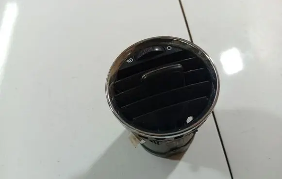 Dash center air vent grill