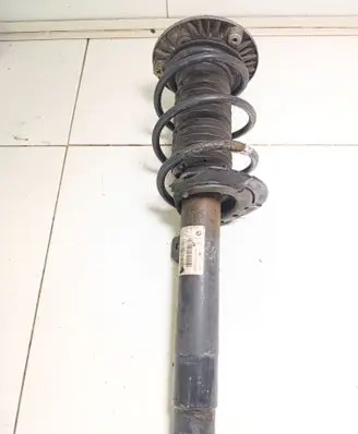 Front shock absorber with coil spring