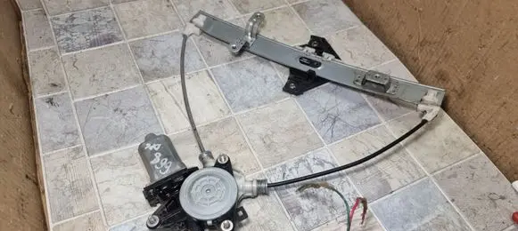 Suzuki Liana Rear door window regulator with motor 8343076F10 0621009291