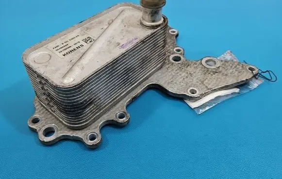 Opel Insignia A Engine oil radiator 55486899 IMPRK1561728