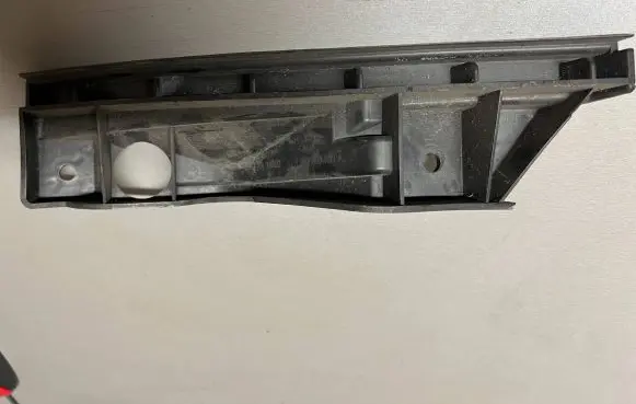 Volkswagen Touran I Front bumper mounting bracket 1T0807890A
