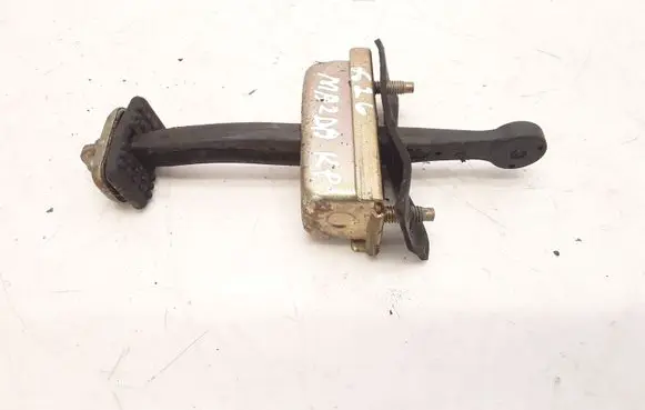 Mazda 626 Front door check strap stopper 5173991
