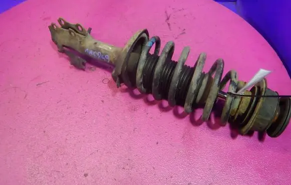 Volkswagen Golf IV Front shock absorber with coil spring