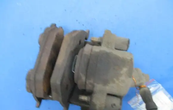 Volkswagen Golf IV Front brake caliper