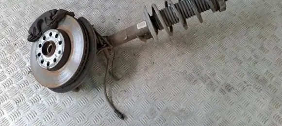 Volkswagen Touran II Front shock absorber with coil spring 1T0412015PQ 210115C0881