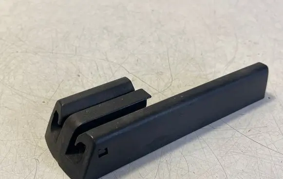 Tesla Model S Front driver seat rail trim 103167500A