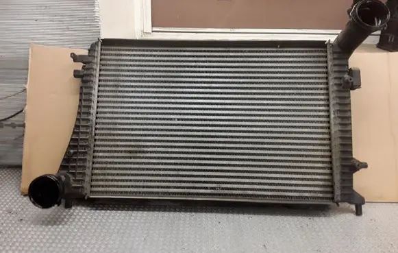 Volkswagen Golf V Intercooler radiator 1K0145803Q