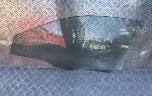Mazda 626 Front door window glass four-door 