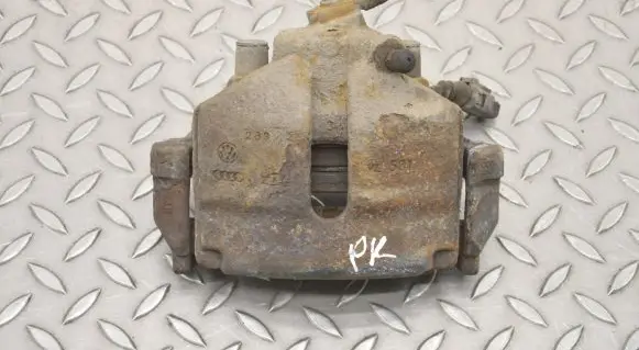 Volkswagen PASSAT B7 Front brake caliper