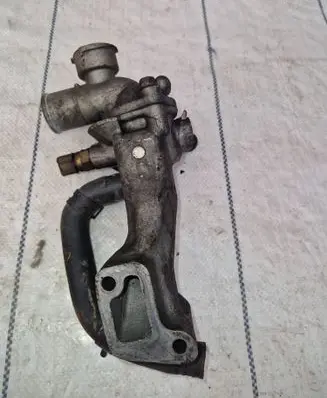 Thermostat/thermostat housing