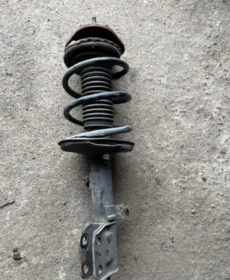 Toyota Corolla Verso AR10 Front shock absorber with coil spring