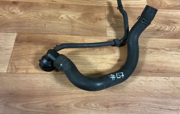 Volkswagen PASSAT B6 Engine coolant pipe/hose 1K0122291