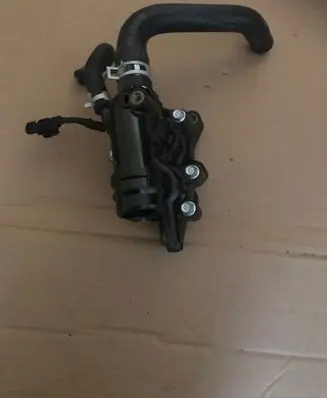 Thermostat/thermostat housing