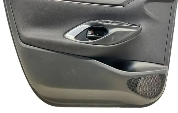 Toyota Yaris XP210 Front door card panel trim