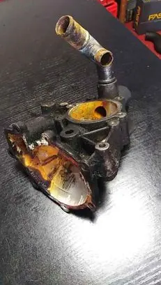 Thermostat/thermostat housing