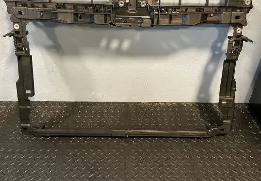 Radiator support slam panel