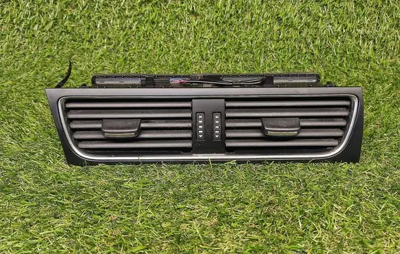 Dash center air vent grill