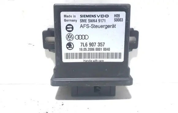 Volkswagen Touareg I Light module LCM 7L6907357