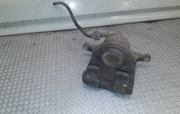 Opel Astra J Front brake caliper