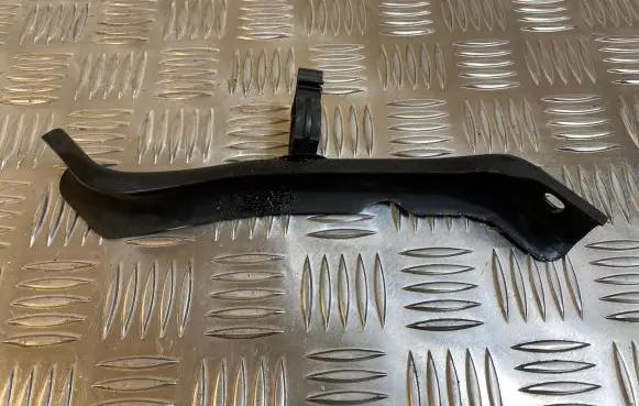 Radiator support slam panel bracket