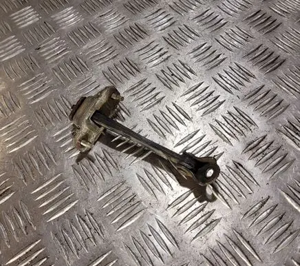 Subaru Legacy Front door check strap stopper