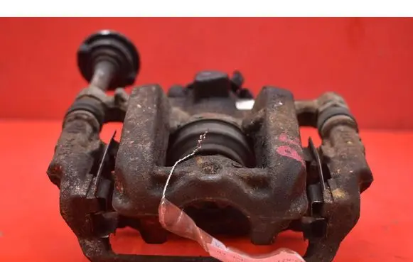 Opel Astra J Rear brake caliper 