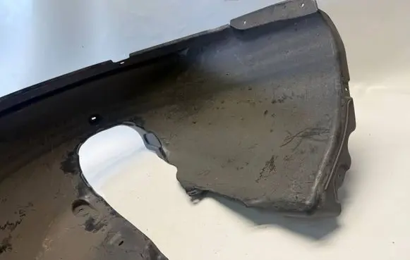 Front wheel arch liner splash guards