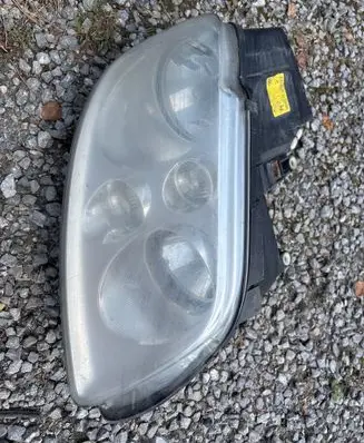 Volkswagen Touran I Headlight/headlamp 0301205602 1T0941006G