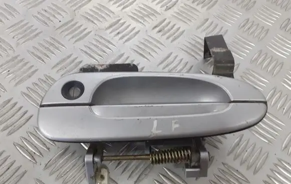 Mazda 626 Front door exterior handle BRAK