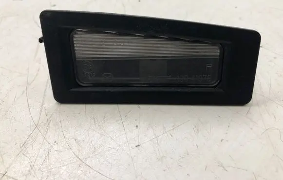 Mazda 3 III Number plate light 13041979