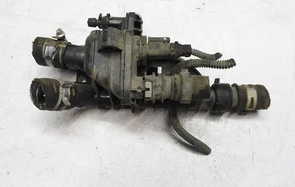 Thermostat/thermostat housing