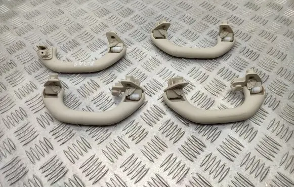 Volkswagen Tiguan A set of handles for the ceiling 1K0857607M 1K0857607N
