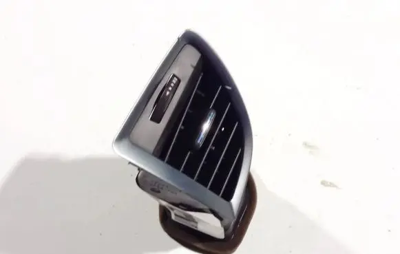 Opel Astra J Dash center air vent grill 07523001 07523-001