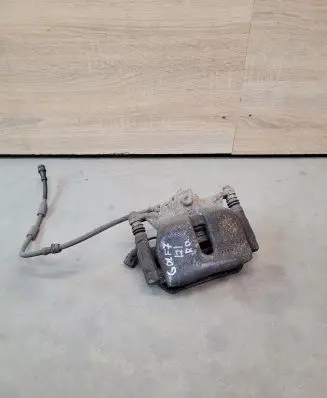 Volkswagen Golf VII Front brake caliper
