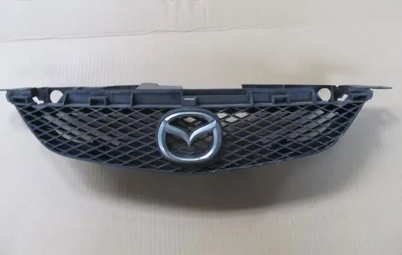 Mazda 323 Front bumper upper radiator grill CZOSNI202102