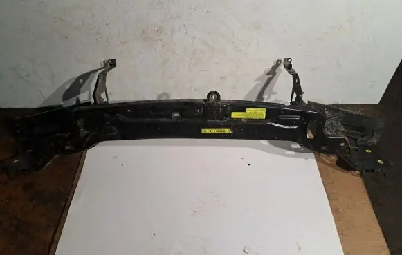 Top upper radiator support slam panel