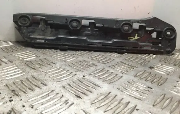 Volkswagen Touran I Front bumper mounting bracket 1T0807935