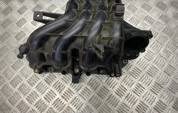 Volkswagen Golf IV Intake manifold 036129711 CX00052