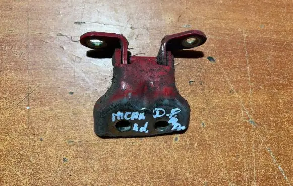 Nissan Micra Front door lower hinge 