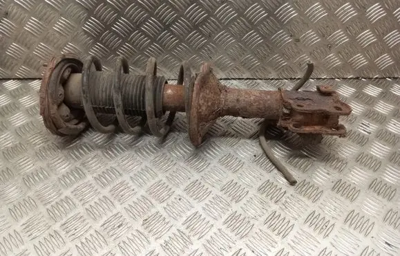 Nissan Sunny Front shock absorber with coil spring