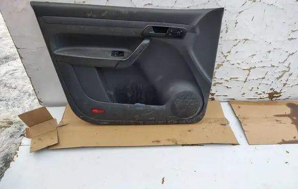 Volkswagen Caddy Coupe rear side trim panel 