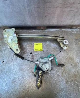 Hyundai Coupe Front door window regulator with motor 
