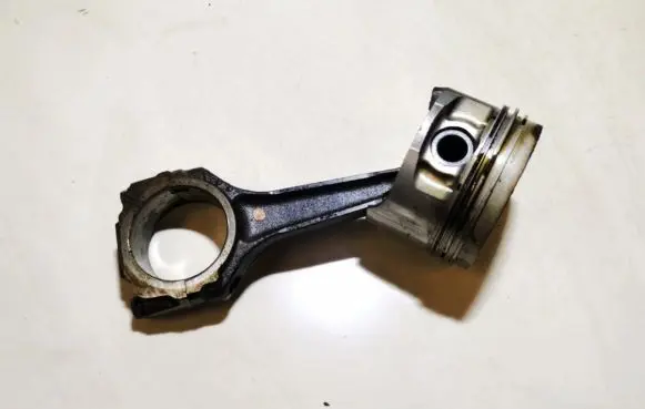 Piston with connecting rod