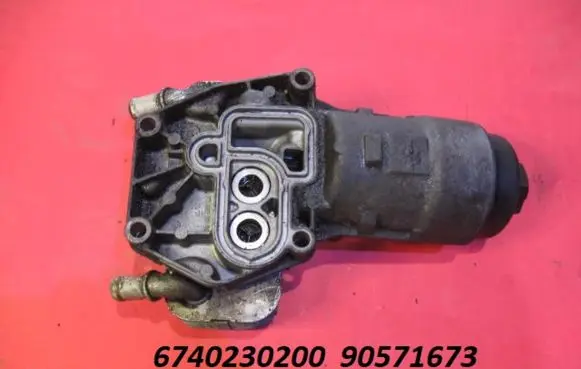 Opel Frontera A Oil filter mounting bracket 6740230200 90571673