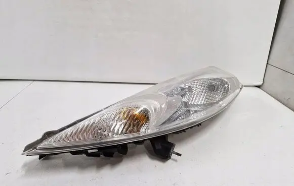Nissan Juke I F15 Headlight/headlamp