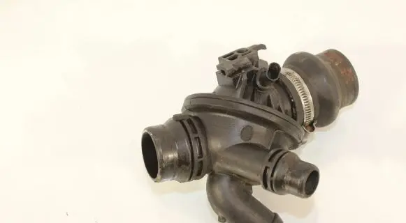 Thermostat/thermostat housing