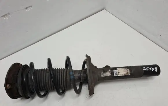 Volkswagen Golf VII Front shock absorber with coil spring 5Q0412014ME